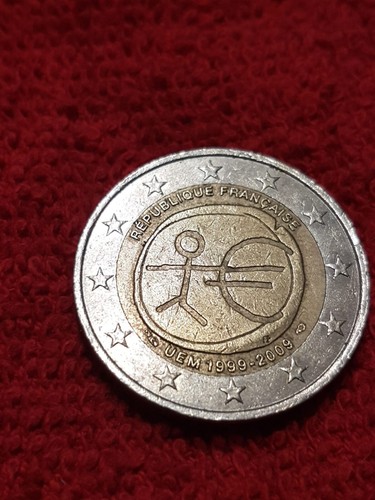 Moneta due euro omino - €),